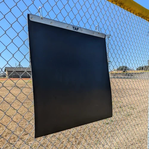 Portable Plyo Mat hanging on a fence Portable Plyo Mat hanging on a fence